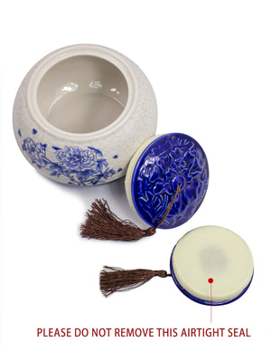 [product type] | Dahlia Vintage Peony Blue and White Embossed Porcelain Tea Canister with Tassel | Dahlia